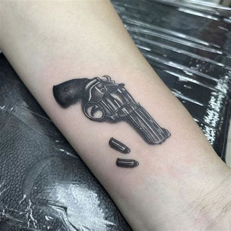 15 Most Creative Gun Tattoo Designs With Pictures