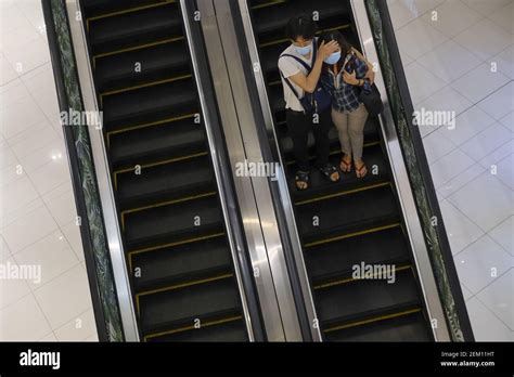 A Couple Wearing Masks At Kl Sentral In Kuala Lumpur Conditional