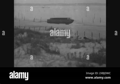 An Amphibious Landing Craft Is Driven Into And Out Of Chesapeake Bay At