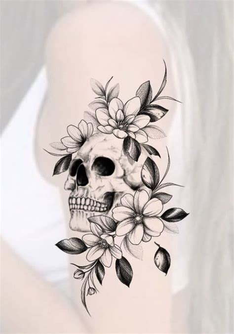 Feminine Skull Tattoo With Floral Design