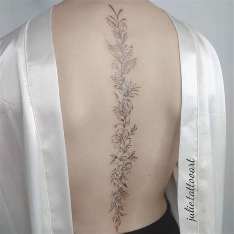 Floral Tattoo Down Spine At Mariam Oberg Blog Floral Tattoo Down Spine At Mariam Oberg Blog