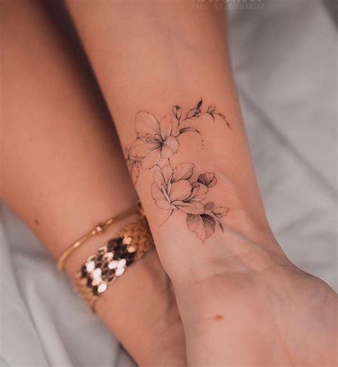 Floral Wrist Tattoo Flower Wrist Tattoo Wrist Tattoo Designs Feminine
