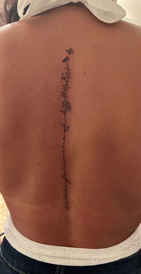 Flower Tattoo On Spine