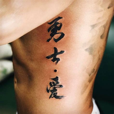 Lewis Hamilton Unveiled A New Chinese Lettering Tattoo On Same Day He Lewis Hamilton Unveiled A New Chinese Lettering Tattoo On Same Day He
