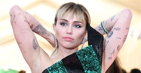 Miley Cyrus Amp 39 Tattoos Guide To All Her Ink And Their Meanings