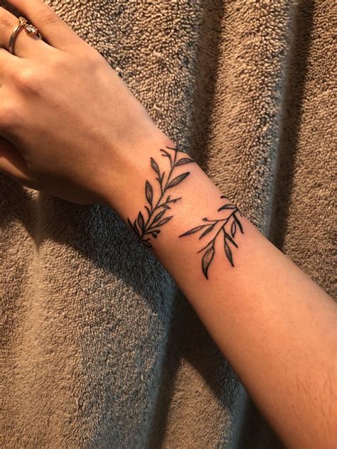 Olive Branches Tattoo Arms Wrap Around Wrist Tattoos Around Arm