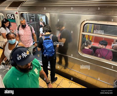 Riders Exit An F Train At The Broadway Lafayette Station In The Soho