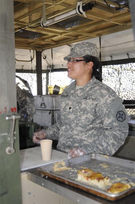 U S Army Spc Maria Barajas A Food Service Specialist With The 737Th Transportation Company U S Army Reserve Based Out Of Yakima Wash Makes Homemade Pineapple Upside Down Cake During The Unit S Connelly Award