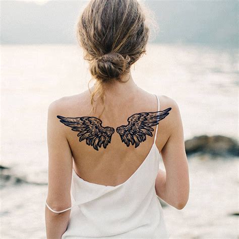 Wings On The Back Tattoo Ideas At Iris Gamez Blog Wings On The Back Tattoo Ideas At Iris Gamez Blog