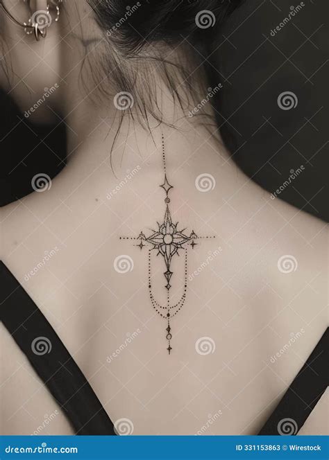 Woman S Back With An Intricate Geometric Tattoo Design On Her Upper Woman S Back With An Intricate Geometric Tattoo Design On Her Upper